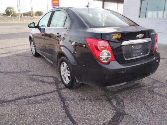 2014 Chevrolet Sonic LT Auto Sedan (1G1JC5SH7E4) with an 1.8L L4 DOHC 24V engine, 6-Speed Automatic transmission, located at 4047 Montana Ave., Billings, MT, 59101, 45.770847, -108.529800 - Photo #6