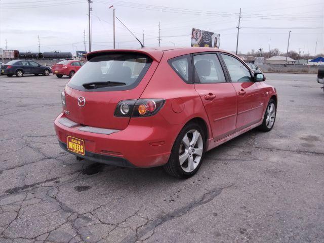 2005 Mazda MAZDA3 s 5-Door (JM1BK143251) with an 2.3L L4 DOHC 16V engine, located at 4047 Montana Ave., Billings, MT, 59101, 45.770847, -108.529800 - Photo #5