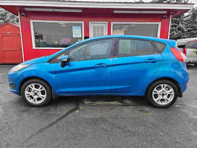 2015 Ford Fiesta SE Hatchback (3FADP4EJ6FM) with an 1.6L L4 DOHC 16V engine, located at 601 E. Idaho St., Kalispell, MT, 59901, 48.203983, -114.308662 - Photo #1