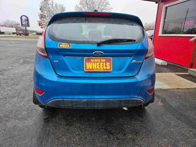 2015 Ford Fiesta SE Hatchback (3FADP4EJ6FM) with an 1.6L L4 DOHC 16V engine, located at 601 E. Idaho St., Kalispell, MT, 59901, 48.203983, -114.308662 - Photo #3