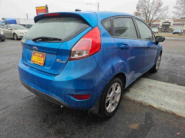 2015 Ford Fiesta SE Hatchback (3FADP4EJ6FM) with an 1.6L L4 DOHC 16V engine, located at 601 E. Idaho St., Kalispell, MT, 59901, 0.000000, 0.000000 - Photo #4