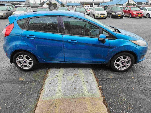 2015 Ford Fiesta SE Hatchback (3FADP4EJ6FM) with an 1.6L L4 DOHC 16V engine, located at 601 E. Idaho St., Kalispell, MT, 59901, 48.203983, -114.308662 - Photo #5