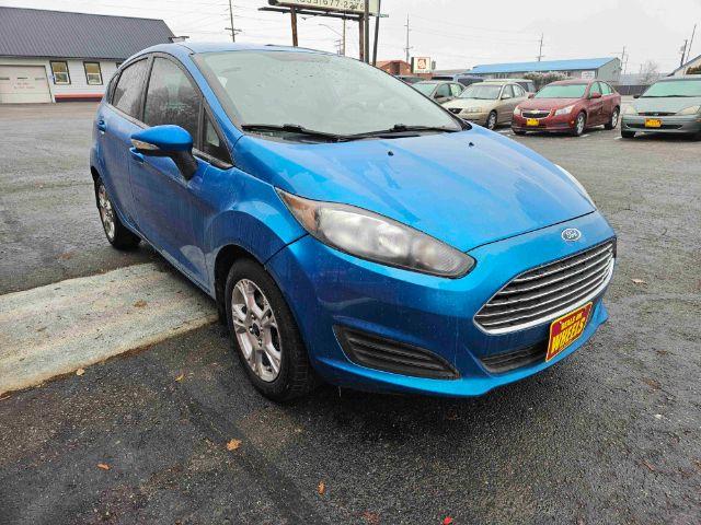2015 Ford Fiesta SE Hatchback (3FADP4EJ6FM) with an 1.6L L4 DOHC 16V engine, located at 601 E. Idaho St., Kalispell, MT, 59901, 48.203983, -114.308662 - Photo #6