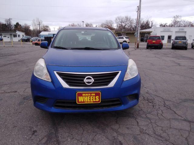 2012 Nissan Versa 1.6 SV Sedan (3N1CN7AP3CL) with an 1.6L L4 DOHC 16V engine, located at 4047 Montana Ave., Billings, MT, 59101, 45.770847, -108.529800 - Photo #2