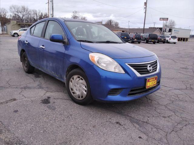 2012 Nissan Versa 1.6 SV Sedan (3N1CN7AP3CL) with an 1.6L L4 DOHC 16V engine, located at 4047 Montana Ave., Billings, MT, 59101, 45.770847, -108.529800 - Photo #3