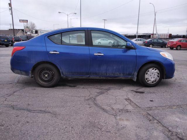 2012 Nissan Versa 1.6 SV Sedan (3N1CN7AP3CL) with an 1.6L L4 DOHC 16V engine, located at 4047 Montana Ave., Billings, MT, 59101, 45.770847, -108.529800 - Photo #4