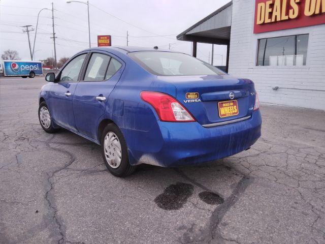 2012 Nissan Versa 1.6 SV Sedan (3N1CN7AP3CL) with an 1.6L L4 DOHC 16V engine, located at 4047 Montana Ave., Billings, MT, 59101, 45.770847, -108.529800 - Photo #7