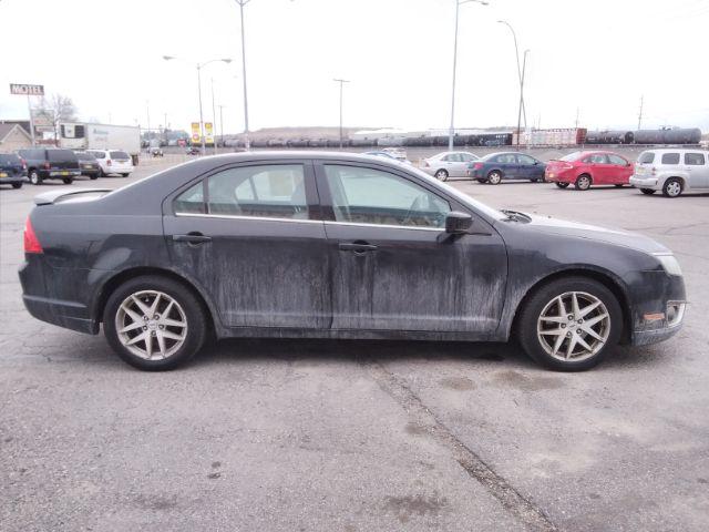 2011 Ford Fusion I4 SEL (3FAHP0JA5BR) with an 2.5L L4 DOHC 16V engine, located at 4047 Montana Ave., Billings, MT, 59101, 45.770847, -108.529800 - Photo #4
