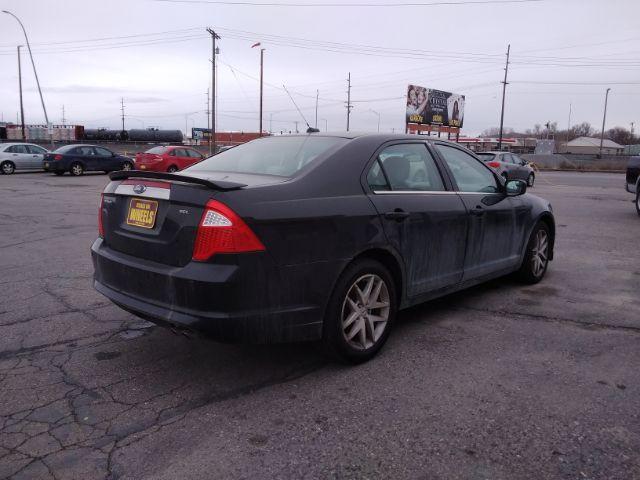 2011 Ford Fusion I4 SEL (3FAHP0JA5BR) with an 2.5L L4 DOHC 16V engine, located at 4047 Montana Ave., Billings, MT, 59101, 45.770847, -108.529800 - Photo #5