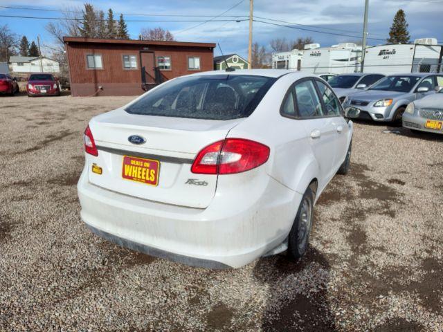 2012 Ford Fiesta SE Sedan (3FADP4BJ6CM) with an 1.6L L4 DOHC 16V engine, located at 4801 10th Ave S,, Great Falls, MT, 59405, 47.494347, -111.229942 - Photo #4