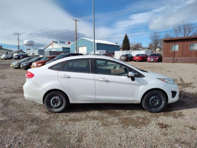 2012 Ford Fiesta SE Sedan (3FADP4BJ6CM) with an 1.6L L4 DOHC 16V engine, located at 4801 10th Ave S,, Great Falls, MT, 59405, 47.494347, -111.229942 - Photo #5