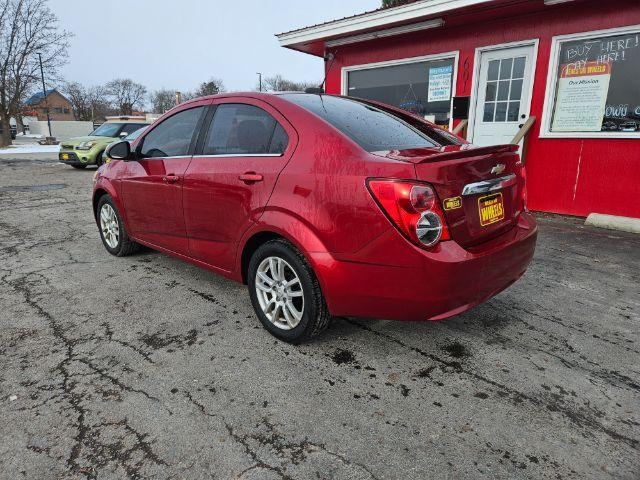 2015 Chevrolet Sonic LT Auto Sedan (1G1JC5SH4F4) with an 1.8L L4 DOHC 24V engine, 6-Speed Automatic transmission, located at 601 E. Idaho St., Kalispell, MT, 59901, 0.000000, 0.000000 - Photo #2