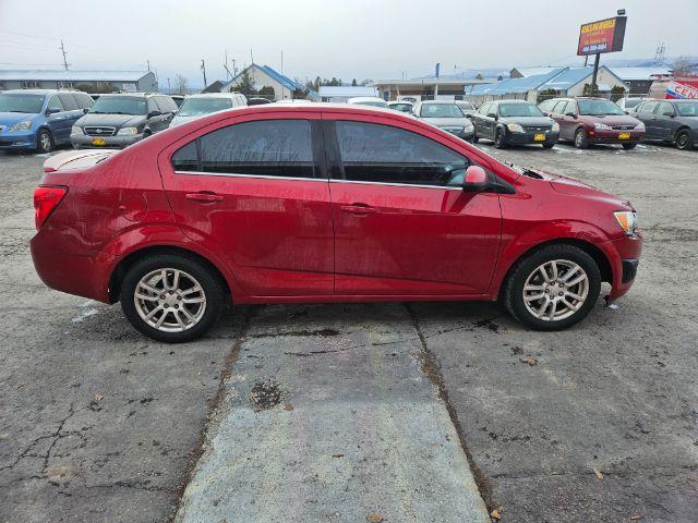 2015 Chevrolet Sonic LT Auto Sedan (1G1JC5SH4F4) with an 1.8L L4 DOHC 24V engine, 6-Speed Automatic transmission, located at 601 E. Idaho St., Kalispell, MT, 59901, 0.000000, 0.000000 - Photo #5