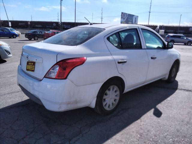 2015 Nissan Versa 1.6 S 5M (3N1CN7AP6FL) with an 1.6L L4 DOHC 16V engine, 5-Speed Manual transmission, located at 4047 Montana Ave., Billings, MT, 59101, 45.770847, -108.529800 - Photo #5
