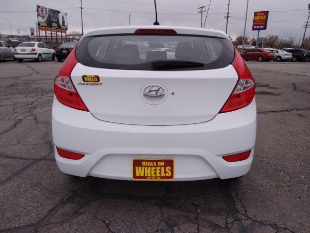 2016 Hyundai Accent SE 5-Door 6A (KMHCT5AE0GU) with an 1.6L L4 DOHC 16V engine, 6-Speed Automatic transmission, located at 4047 Montana Ave., Billings, MT, 59101, 45.770847, -108.529800 - Photo #5