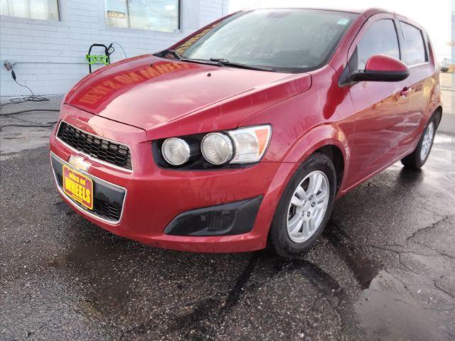 2013 Chevrolet Sonic LT Auto 5-Door (1G1JC6SB3D4) with an 1.4L L4 DOHC 24V TURBO engine, 6-Speed Automatic transmission, located at 4047 Montana Ave., Billings, MT, 59101, 45.770847, -108.529800 - Photo #0