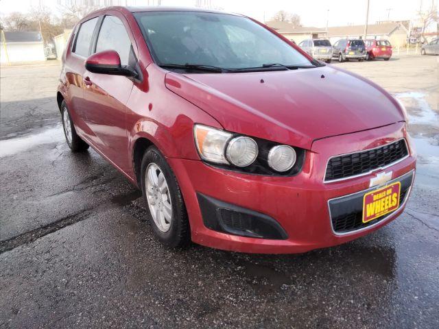 2013 Chevrolet Sonic LT Auto 5-Door (1G1JC6SB3D4) with an 1.4L L4 DOHC 24V TURBO engine, 6-Speed Automatic transmission, located at 4047 Montana Ave., Billings, MT, 59101, 45.770847, -108.529800 - Photo #2