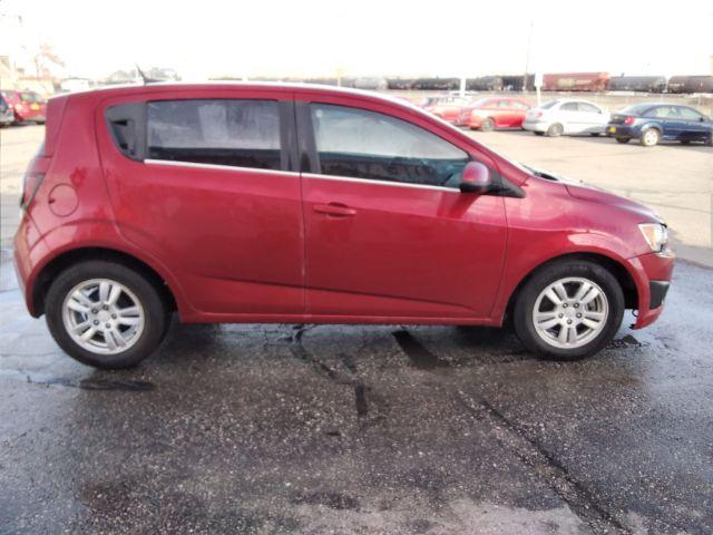 2013 Chevrolet Sonic LT Auto 5-Door (1G1JC6SB3D4) with an 1.4L L4 DOHC 24V TURBO engine, 6-Speed Automatic transmission, located at 4047 Montana Ave., Billings, MT, 59101, 45.770847, -108.529800 - Photo #3