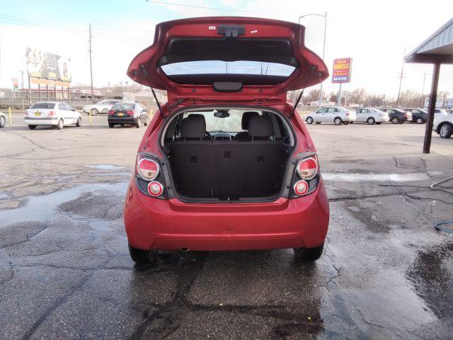 2013 Chevrolet Sonic LT Auto 5-Door (1G1JC6SB3D4) with an 1.4L L4 DOHC 24V TURBO engine, 6-Speed Automatic transmission, located at 4047 Montana Ave., Billings, MT, 59101, 45.770847, -108.529800 - Photo #5