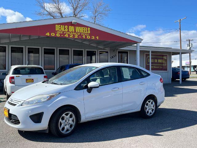 2013 Ford Fiesta S Sedan (3FADP4AJXDM) with an 1.6L L4 DOHC 16V engine, located at 1821 N Montana Ave., Helena, MT, 59601, 46.603447, -112.022781 - Photo #0