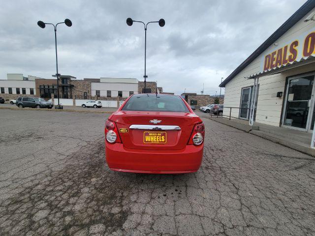 2014 Chevrolet Sonic LT Auto Sedan (1G1JC5SH2E4) with an 1.8L L4 DOHC 24V engine, 6-Speed Automatic transmission, located at 1800 West Broadway, Missoula, 59808, (406) 543-1986, 46.881348, -114.023628 - Photo #2