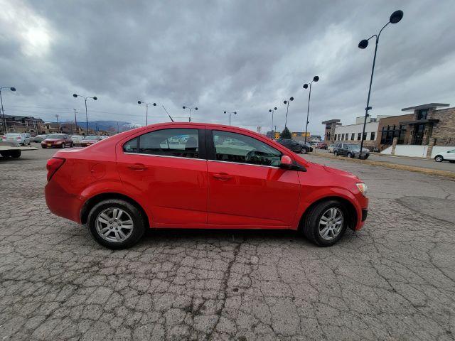2014 Chevrolet Sonic LT Auto Sedan (1G1JC5SH2E4) with an 1.8L L4 DOHC 24V engine, 6-Speed Automatic transmission, located at 1800 West Broadway, Missoula, 59808, (406) 543-1986, 46.881348, -114.023628 - Photo #3