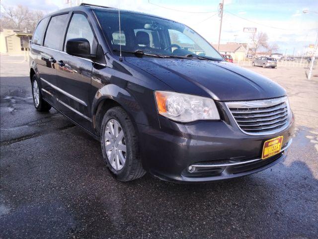 2014 Chrysler Town and Country Touring (2C4RC1BG1ER) with an 3.6L V6 DOHC 24V engine, 6-Speed Automatic transmission, located at 4047 Montana Ave., Billings, MT, 59101, 45.770847, -108.529800 - Photo #2