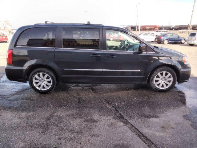 2014 Chrysler Town and Country Touring (2C4RC1BG1ER) with an 3.6L V6 DOHC 24V engine, 6-Speed Automatic transmission, located at 4047 Montana Ave., Billings, MT, 59101, 45.770847, -108.529800 - Photo #3