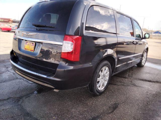 2014 Chrysler Town and Country Touring (2C4RC1BG1ER) with an 3.6L V6 DOHC 24V engine, 6-Speed Automatic transmission, located at 4047 Montana Ave., Billings, MT, 59101, 45.770847, -108.529800 - Photo #4