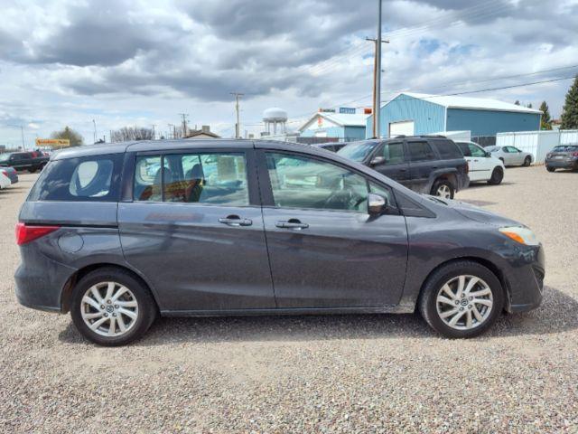 2014 Mazda MAZDA5 Sport AT (JM1CW2BL5E0) with an 2.5L L4 DOHC 16V engine, 5-Speed Automatic transmission, located at 4801 10th Ave S,, Great Falls, MT, 59405, (406) 564-1505, 0.000000, 0.000000 - Photo #5