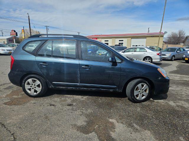 2009 Kia Rondo LX (KNAFG529097) with an 2.4L L4 DOHC 16V engine, 4-Speed Automatic transmission, located at 1821 N Montana Ave., Helena, MT, 59601, 46.603447, -112.022781 - Photo #2