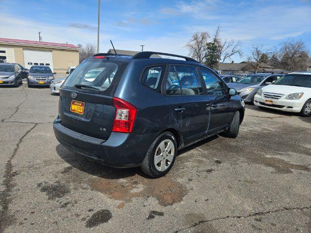 2009 Kia Rondo LX (KNAFG529097) with an 2.4L L4 DOHC 16V engine, 4-Speed Automatic transmission, located at 1821 N Montana Ave., Helena, MT, 59601, 46.603447, -112.022781 - Photo #3