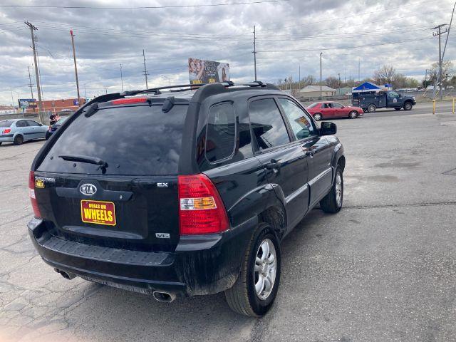 2005 Kia Sportage LX V6 4WD (KNDJE723657) with an 2.7L V6 DOHC 24V engine, 4-Speed Automatic transmission, located at 4047 Montana Ave., Billings, MT, 59101, 45.770847, -108.529800 - Photo #2