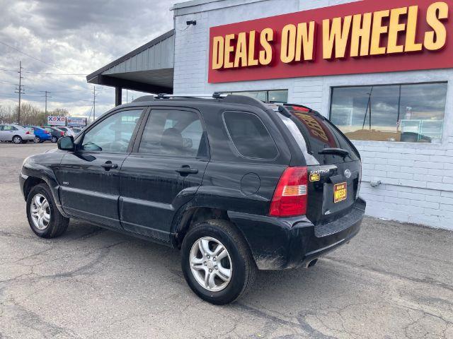 2005 Kia Sportage LX V6 4WD (KNDJE723657) with an 2.7L V6 DOHC 24V engine, 4-Speed Automatic transmission, located at 4047 Montana Ave., Billings, MT, 59101, 45.770847, -108.529800 - Photo #3
